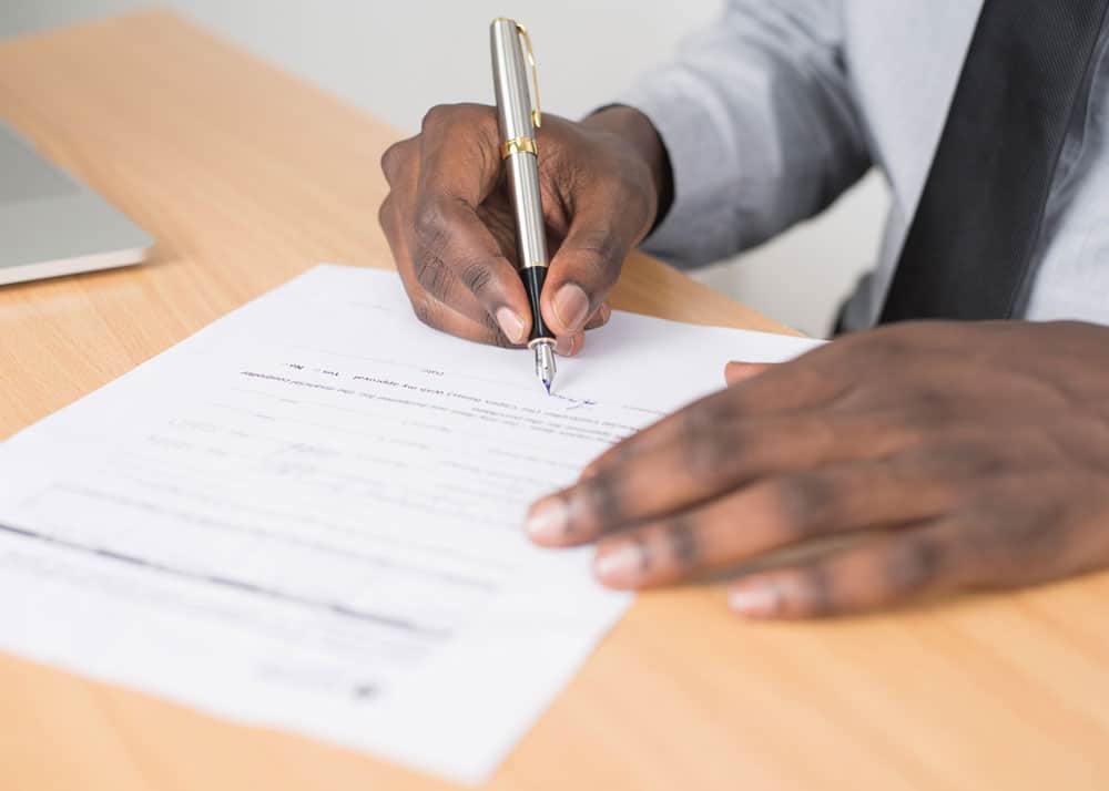 Man Signing a Contract